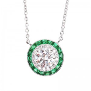 Kwiat 18k White Gold "Silhouette" Diamond and Emerald Pendant  (1) Round Brilliant Diamond 0.60 ct (G, SI