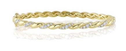 14k Yellow Gold Twisted Diamond Bangle With 0.81 Carats of Round Diamonds.